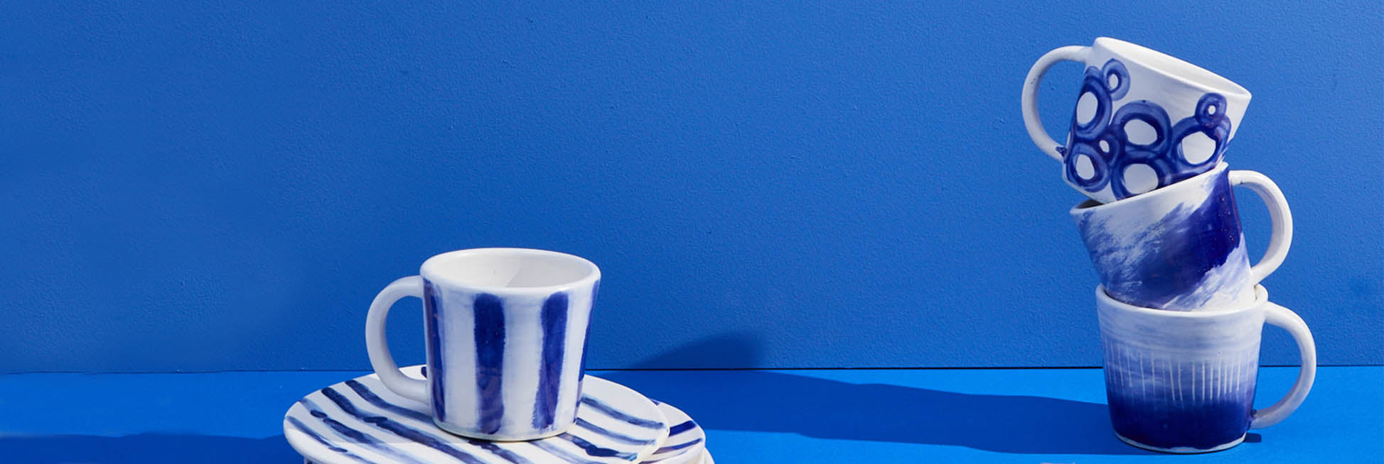 Blue painted mugs and dinnerware