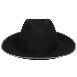 Artesano Fall 2018 Paresi Hat in Black. The Paresi is an easy classic panama hat with a twist of color and detail. Featuring pinched crown top, lined with an interior grosgrain ribbon and finished with contrasting ivory stitch along the edge of the brim. Adjustable interior hat band for perfect fitting. Handmade in Ecuador. 2.8" brim. 22.5" circumference. Color black white. 100% wool felt. One size.