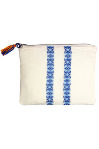 Elina Lebessi Plaka Pochette in Light Blue. Blue and white woven pattern; zip closure with small tassel. Handcrafted by artisans in rural areas in a small workshop outside of Crete. Waterproof interior lining making it the perfect travel accessory for packing toiletries or swimsuits. Small measures 5.5 inches by 8.5 inches. Large measures  8.5 inches by 11 inches. Color blue white. Sizes Small Large.