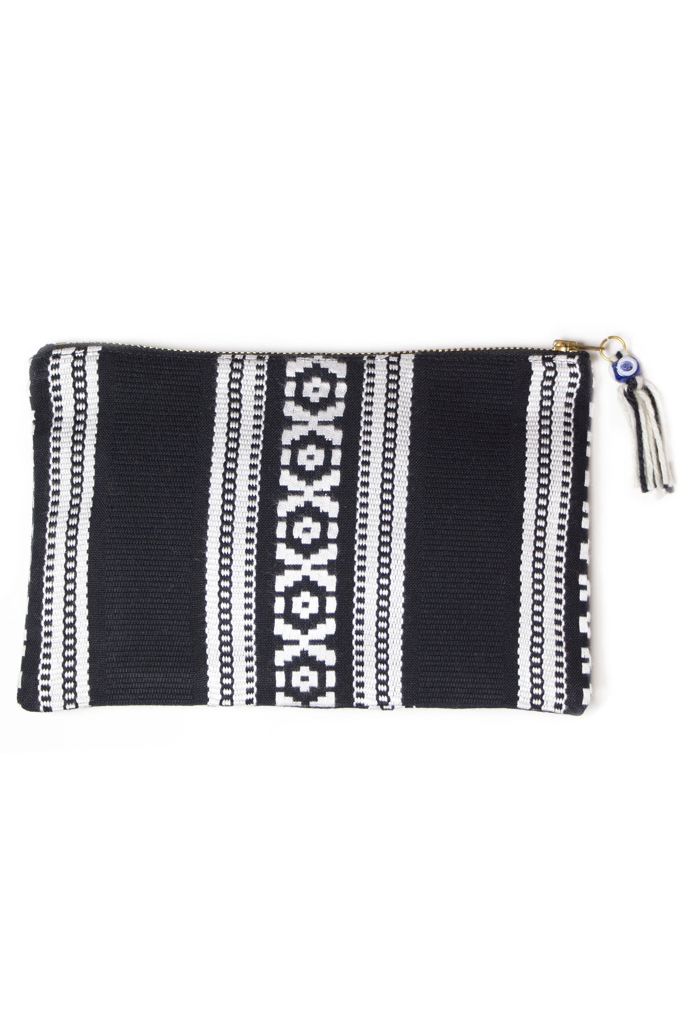 Elina Lebessi Elektra Pochette in Black. Black and white woven pattern; zip closure with small tassel. Handcrafted by artisans in rural areas in a small workshop outside of Crete. Waterproof interior lining making it the perfect travel accessory for packing toiletries or swimsuits. Small measures 5.5 inches by 8.5 inches. Large measures  8.5 inches by 11 inches. Color black. Sizes Small Large.
