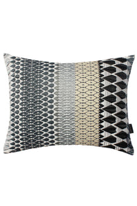 Iceni Present Cushion by Margo Selby. Inspired by the forms of cut jewels, and woven in a monochrome color scheme Iceni is an iconic Margo Selby fabric. Woven using mixed fibers including a heat-shri​nk yarn which creates a tension in the cloth to create an embossed-like surface. Color grey. 46% Cotton, 32% Acrylic, 22% Polyester.