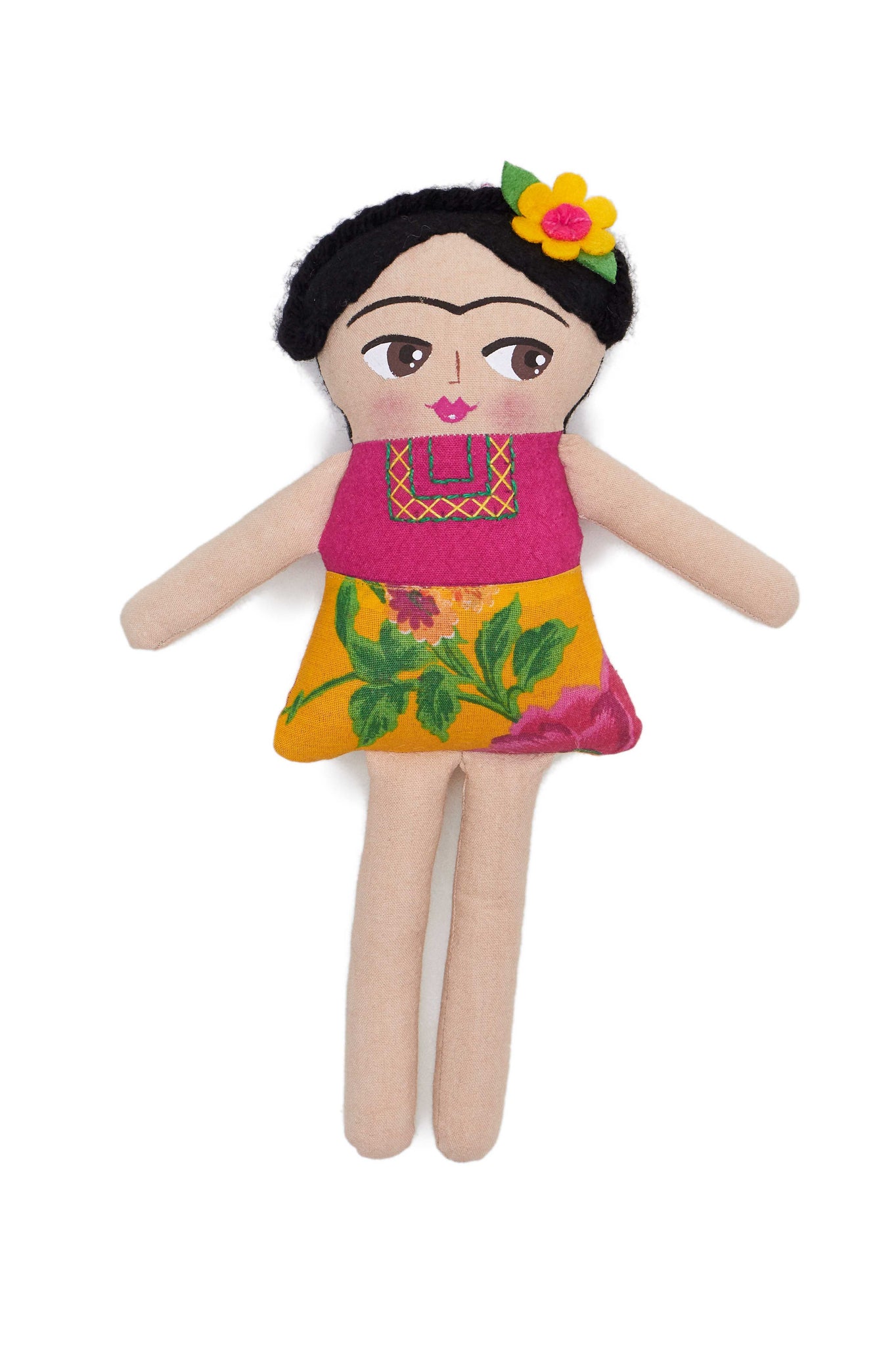 Handmade Frida Doll by Nativa. Handcrafted in Mexico. Hand painted Frida Khalo cotton plush doll. 100% cotton. Spot clean only. Embroidery design and color placement may vary due to the handmade nature of each piece. Color multi. 100% cotton.