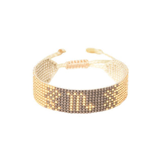 scorpio zodiac gold and taupe beaded bracelet, handmade by Colombian artisans