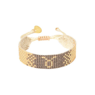 beaded gold and neutral beaded friendship bracelet - Taurus astrological design