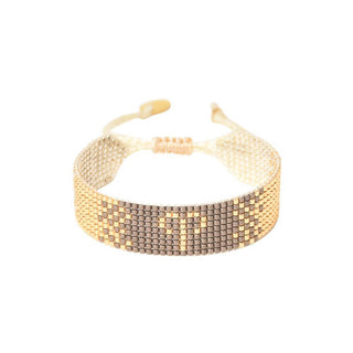 gold and neutral beaded beaded aries zodiac bracelet
