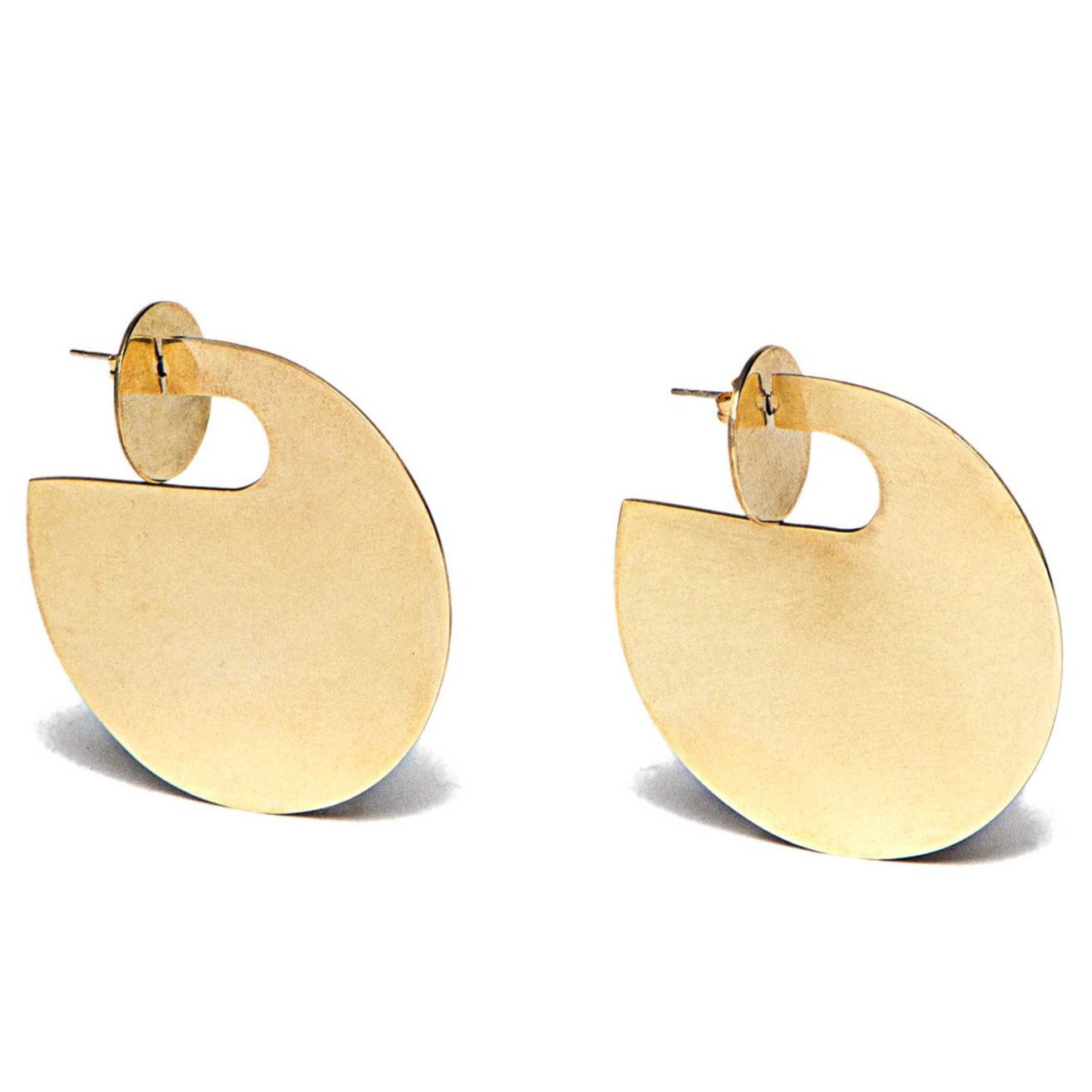 Accompany Exclusive Soko Double Coin Jacket Earring. Brass plate statement jacket earrings. Post fastening for pierced ears. Handcrafted in Kenya using traditional artisan techniques. 1.75 inch diameter. Color gold. 100% recycled brass. One size.